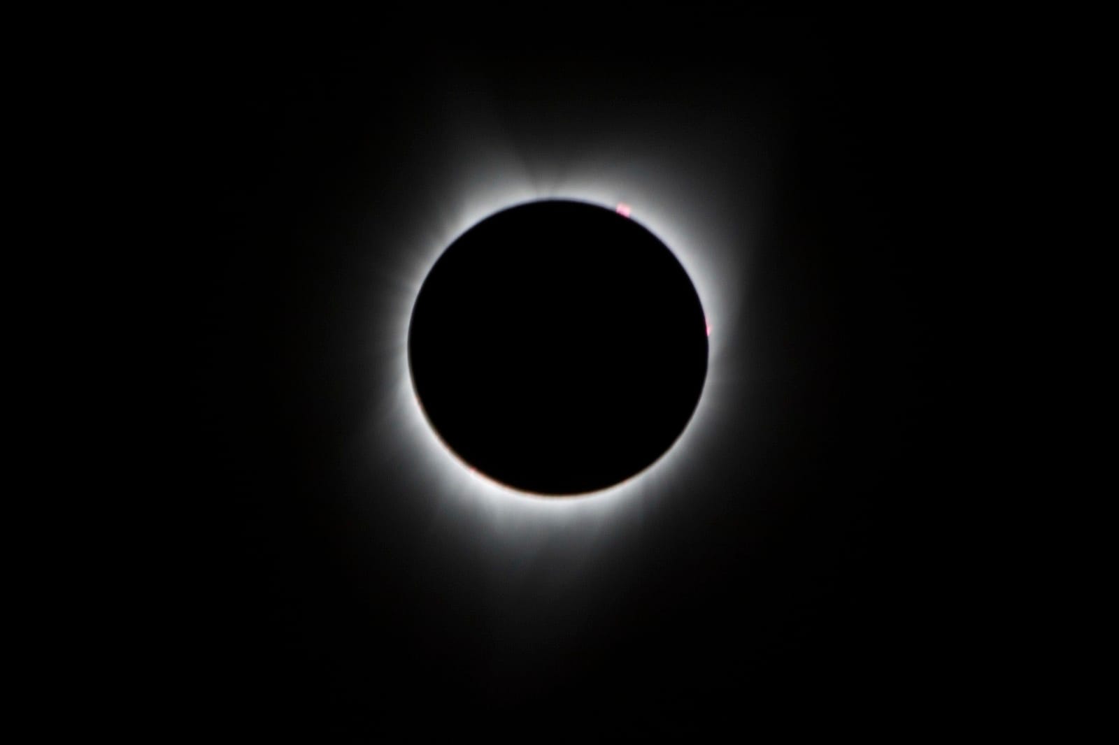 The solar corona visible around the Moon during a total solar eclipse